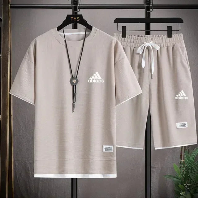 Men's casual short sleeved T-shirt and sports shorts, breathable comfortable running waffle set, summer fashion, 2026
