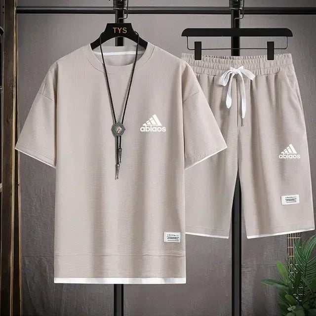 Men's casual short sleeved T-shirt and sports shorts, breathable comfortable running waffle set, summer fashion, 2026