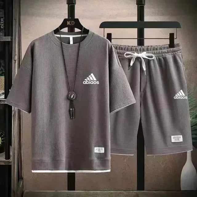 Men's casual short sleeved T-shirt and sports shorts, breathable comfortable running waffle set, summer fashion, 2026