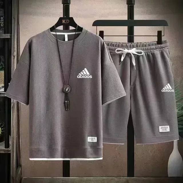 Men's casual short sleeved T-shirt and sports shorts, breathable comfortable running waffle set, summer fashion, 2026