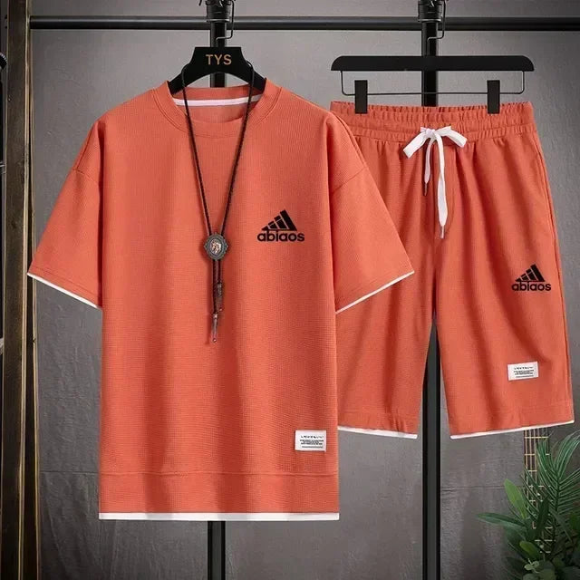 Men's casual short sleeved T-shirt and sports shorts, breathable comfortable running waffle set, summer fashion, 2026